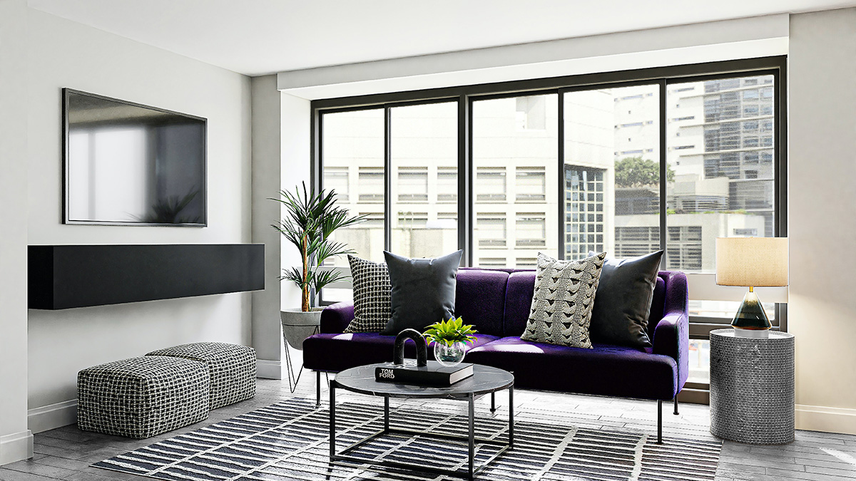 グレーの床と紫のソファ