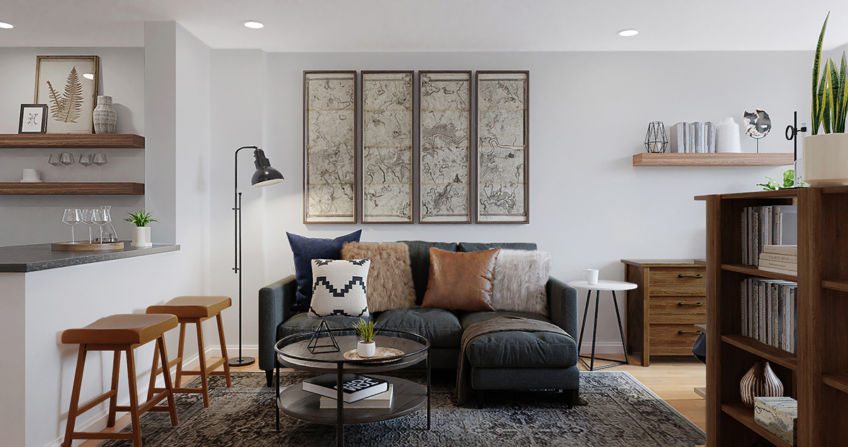 淡い色の床と濃い色の家具のリビング